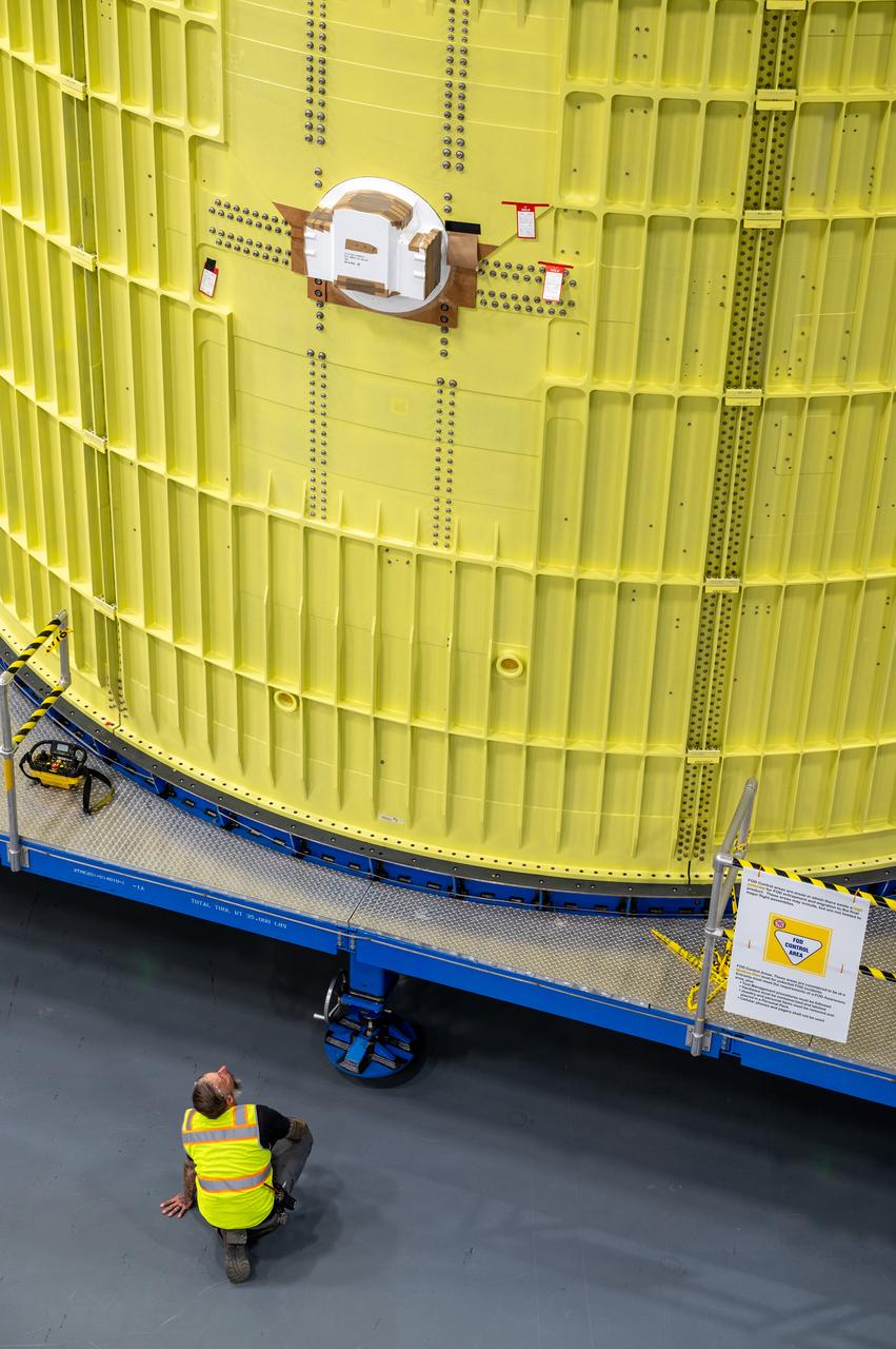 Technicians at NASA’s Michoud Assembly Facility move the intertank of NASA’s Space Launch System rocket for Artemis III to Cell G to await application of the thermal protection system. Thermal protection systems protect space vehicles from aerodynamic heating during entry to planet atmosphere and re-entry to earth atmosphere.  The intertank lays between the liquid hydrogen tank and liquid oxygen tank. Together with the engine section and the forward skirt, they comprise the SLS core stage. The liquid hydrogen tank and liquid oxygen tank hold 733,000 gallons of propellant to power the stage’s four RS-25 engines needed for liftoff and Artemis missions to the Moon and future missions to Mars.